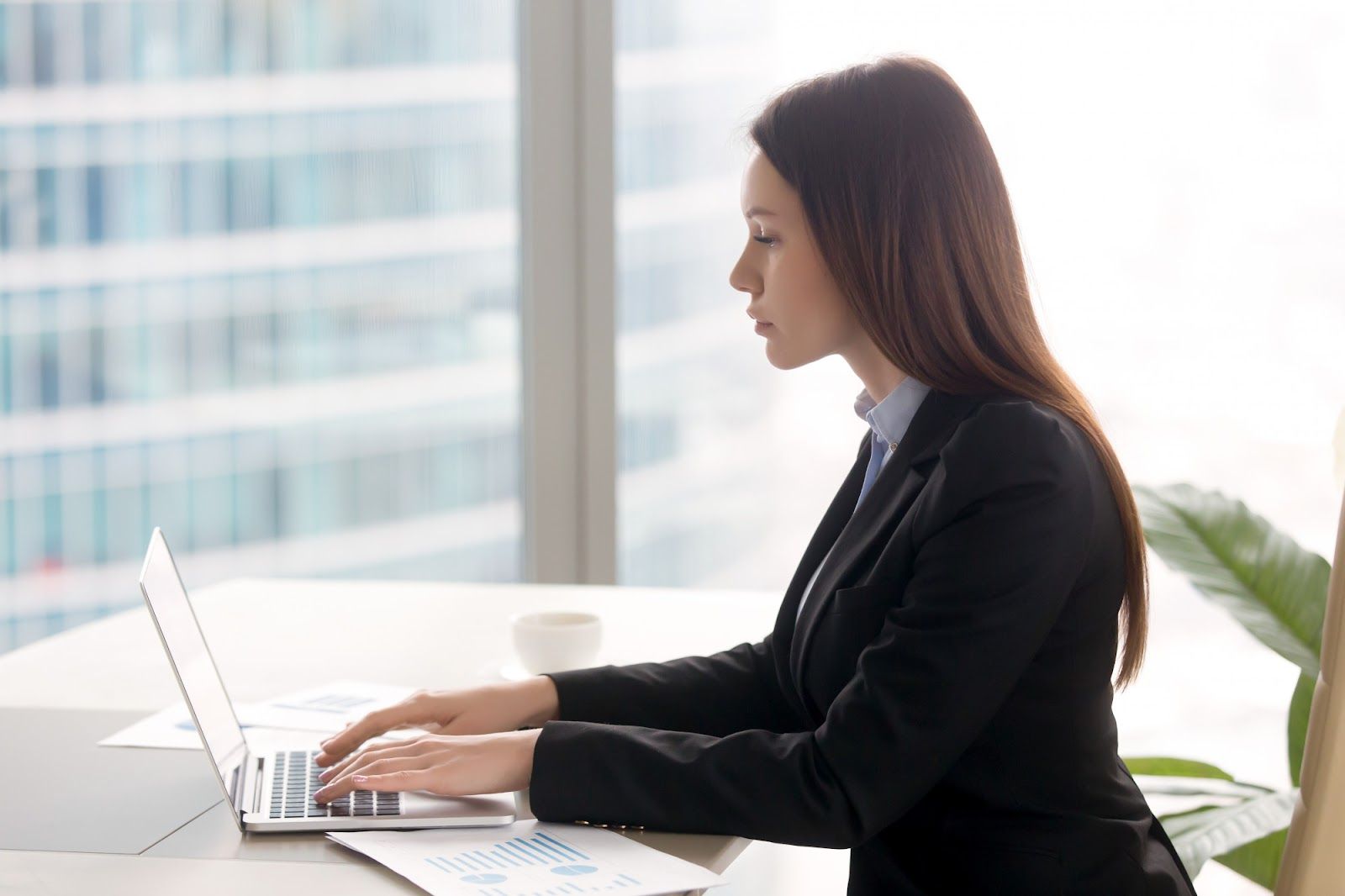 A person sitting at a desk using a computerAI-generated content may be incorrect.